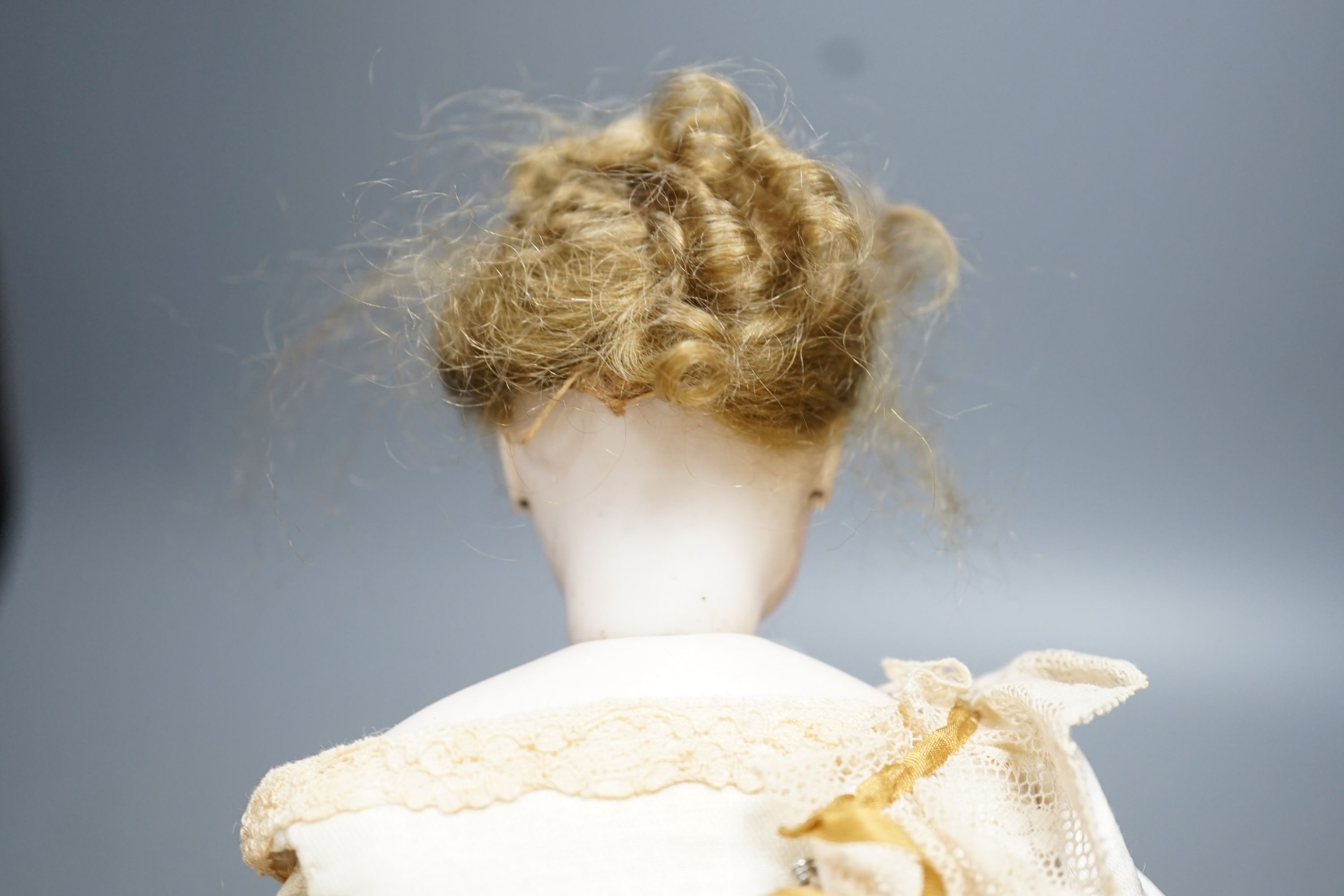 An S.G. bisque shoulder head French fashion doll c.1875, 36cm.